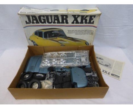 A boxed Monogram Jaguar XKE 1/8 scale unassembled model kit.