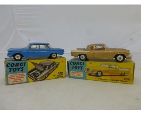 Corgi Toys - Chevrolet Corvair, no. 229, pale blue body, lemon interior, boxed; also Corgi Toys - Studebaker 'Golden Hawk' no