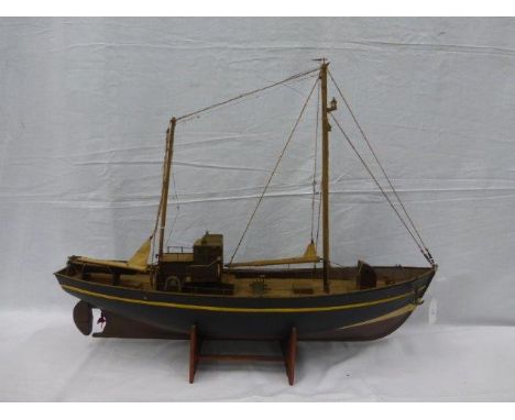 A large scale model of a fishing trawler. 