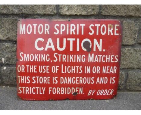 A Motor Spirit Store 'Caution' rectangular enamel sign, 72 x 18".