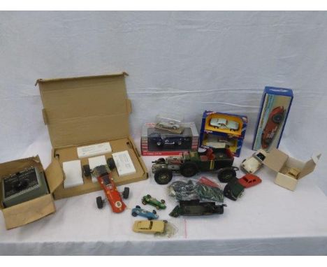 A box of mixed die-cast and model kits including a boxed Schylling Sunbeam 1000 Land Speed Record Car, a Schuco single seater