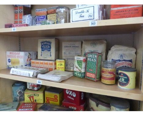 Yesterday's World Museum Grocers - a shelf of various food packaging including two empty packets of Welgar Shredded Wheat, 'P
