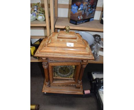 Late 19th or early 20th Century mantel clock in architectural case with brass movement striking on rods