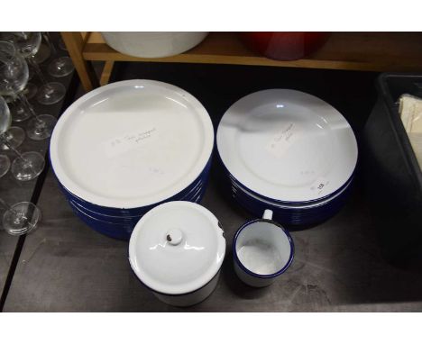 Collection of white enamel plates together with a similar storage jar and mug
