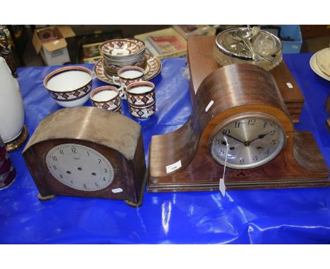 An arch top mahogany mantel clock together with one other, for repair