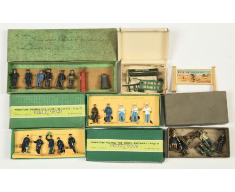Hornby O Gauge Post-war Dinky Toy figures: No.1 Station Staff, No.5 Train and Hotel Staff Station, A box marked A930 Containi