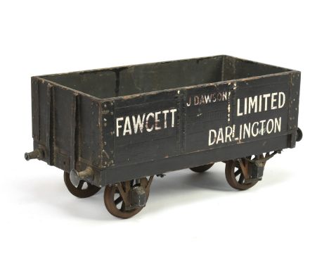 Unmarked 3.5" Large scale wooden open wagon "Fawcett Ltd Darlington", rusting to underside &amp; some parts missing. Conditio