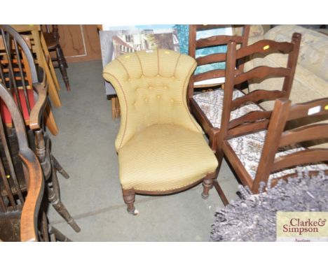 A 19th Century button back nursing chair