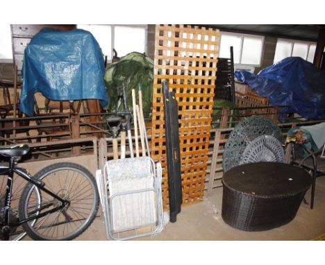 A quantity of long handled gardening tools, folding chair, trellis etc 