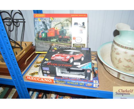 A Hornby electric train set together with a R C Mini Cooper and a Meccano set