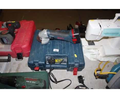 A Bosh cordless angle grinder in fitted case
