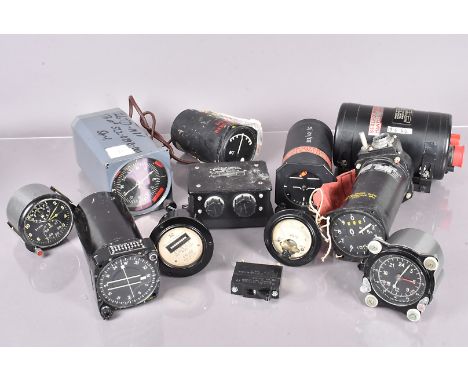 An assortment of aviation dials, to include Heading Selector, Voltmeter, Altimeters, Clocks, compass and more (parcel) 