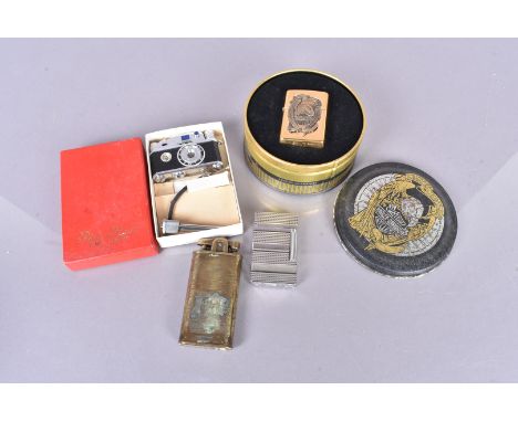 A 1995 brass Harley Davidson Zippo lighter, in retailer's case, together with an S.T Dupont, an Orlik and a Photo Flash camer