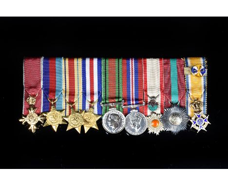 A WWII and Later miniature medal group, unattributed, containing MBE 1939/45 Star, Africa Star, France and Germany Star, Defe