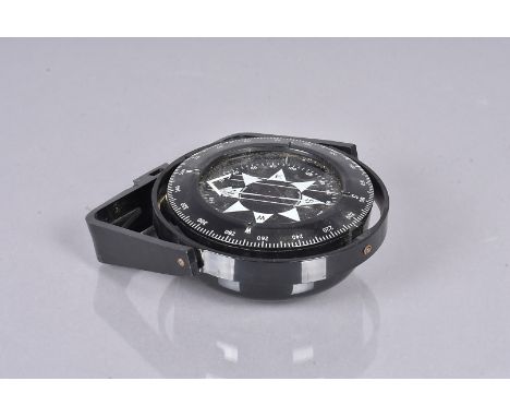 A Heath Marine gimbal compass,  the black plastic compass complete with frame and hanger 