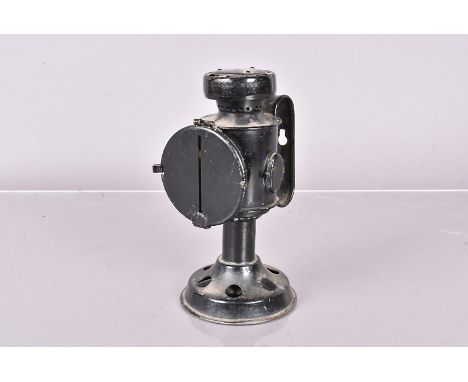 A WWII period Blackout lamp, by T.E Bladon &amp; Son, dated 1940, and broad arrow, also with a later date of 1962 