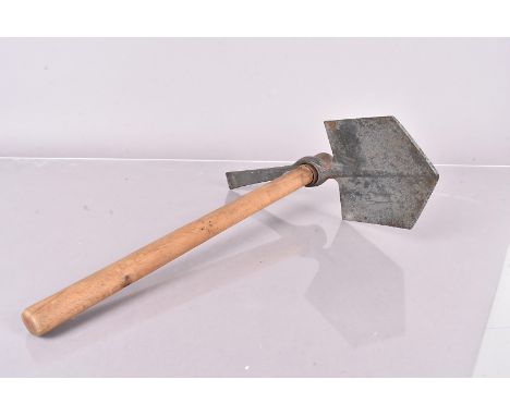 A WWII Entrenching tool, stamped Elwell, 1944 with broad arrow to the spade 