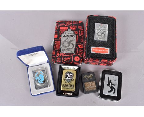 A group of five Zippo lighters, to include the 65th Anniversary, the Biohazard 25th Anniversary, Elvis Jailhouse Rock, Bricky