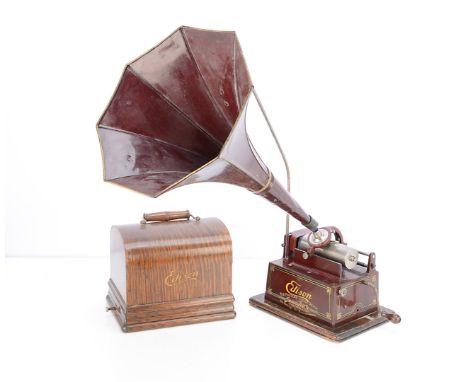 An Edison red Gem phonograph, Model D No. 351817, with K 2 and 4 minute reproducer and maroon Fireside horn (re-touched), the