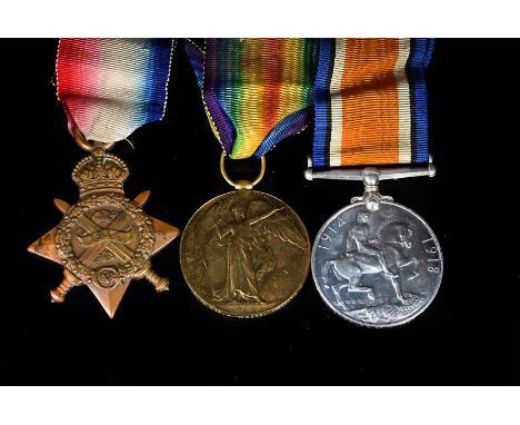 Three WWI medals, to include a Mon Star awarded to Private George T Simpson (L-6135), 1st Middlesex Regiment, the Victory med