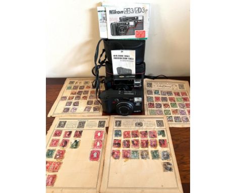 NIKON CAMERA 35ml AND MINOLTA 35ml CAMERA, PLUS QUANTITY OF POSTAGE STAMPS

 