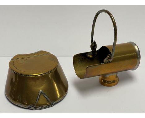 A WWI Trench Art brass and copper snuff box and cover, as a horse hoof with shoe, 7.5cm wide; a similar Trench Art brass mini
