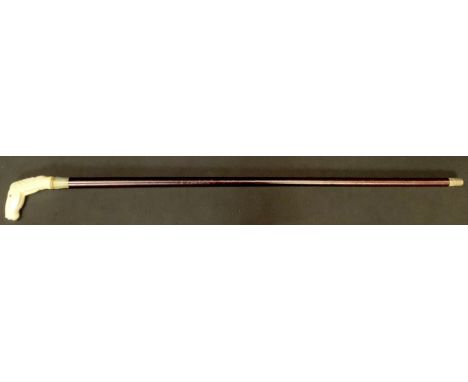 A contemporary carved bone handled walking stick, the handle as the head of a horse, 93cm long 