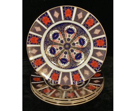 A set of five Royal Crown Derby 1128 pattern dinner plates, first quality, 27cm, printed marks 