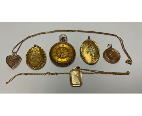 A Victorian 9ct gold fob watch, the dial engine turned, engraved and chased with flowering scrolls; a silver gilt locket; a g