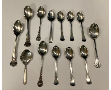 A set of six George V silver trefid teaspoons, London 1927, 95g; a pair of Liberty and Co. silver spoons, Celtic inspired fin