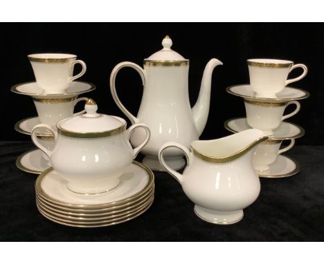 A Wedgwood Chester pattern coffee set, comprising, coffee pot, cream jug and sucrier, six coffee cups, saucers and side plate