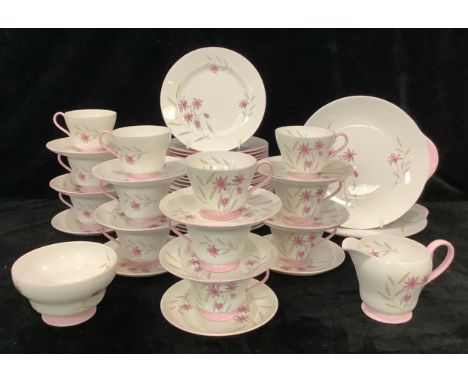 A Shelley Evening Star pattern tea set for twelve, comprising twelve teacups, saucers, tea plates, side plates, milk jug and 