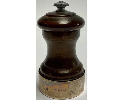 An Elizabeth II silver mounted oak pepper  grinder, Birmingham 1968 
