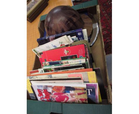 Quantity of rugby and other programmes, a fibre helmet, a table mirror and a stock book of World stamps