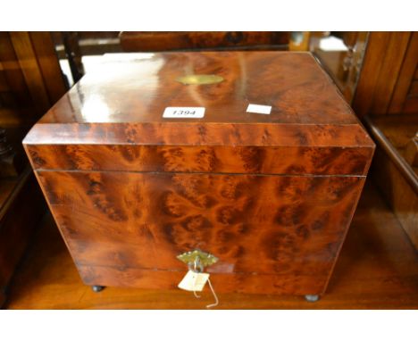 Victorian amboyna liqueur decanter box of rectangular form, the double hinged lid inset with a brass plaque opening to reveal