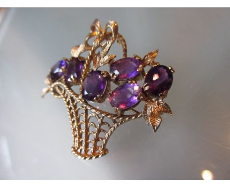 9ct Gold brooch set amethyst stones