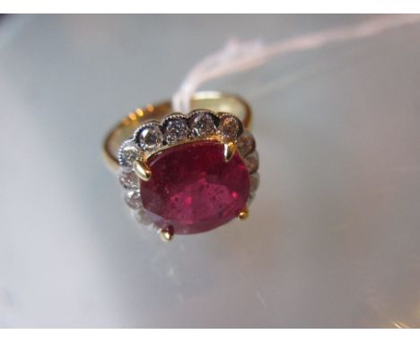 18ct Yellow gold treated ruby and diamond cluster ring