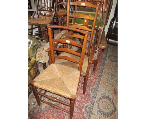 Early 20th Century Liberty style ladder back chair with rush seat together with a similar side chair