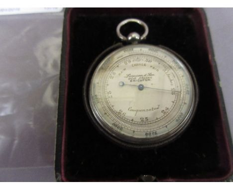 Early 20th Century white metal cased pocket barometer by Lawson and Son, Brighton, housed in a black case