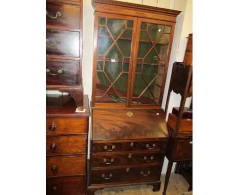 19th Century and later mahogany bureau bookcase having moulded key pattern cornice above two bar glazed doors with fall front