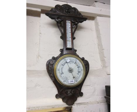 Carved oak aneroid barometer / themometer