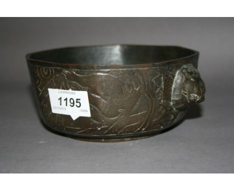 Chinese dark patinated bronze two handled incense burner with dragon decoration, having seal mark to base, 7.25ins diameter x