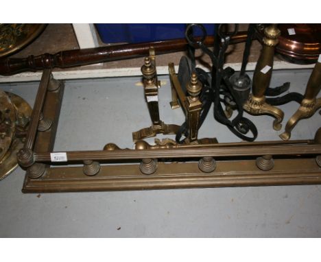 Brass fire kerb, two pairs of brass fire dogs, iron fire side tool set on stand, folding spark guard and two brass fire tools