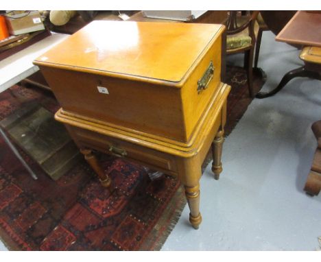 19th Century North Eastern railway honey coloured oak ticket box, the hinged lid enclosing a void interior with divided slidi
