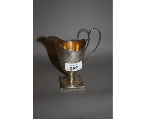 Georgian London silver helmet shaped pedestal cream jug with bright cut decoration