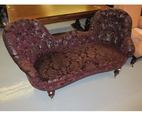 Victorian double spoon back sofa button upholstered in burgundy damask on baluster turned tapering supports with brass caps a