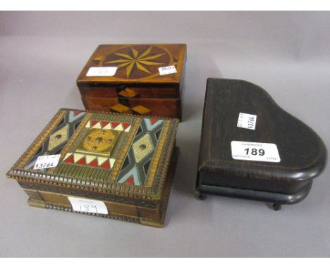 Ebony jewellery casket in the form of a piano, a star inlaid box and cover and another trinket box with hinged cover