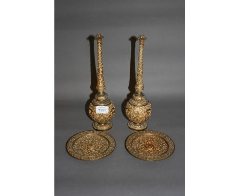 Pair of Middle Eastern gilt bronze rosewater sprinklers with matching small dishes