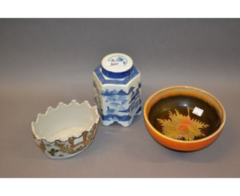 Circular Poole Pottery pedestal bowl, a blue and white porcelain teapoy and an oval Quimper pottery jardinière
