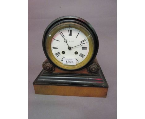 Victorian walnut and part ebonised drum form mantel clock, the enamel dial with Roman numerals, with a two train movement str